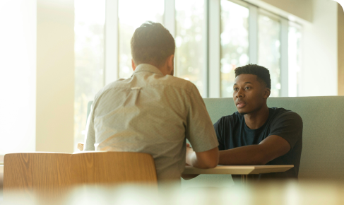 People sitting at a table having a discussion